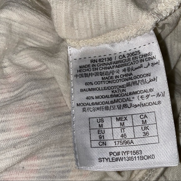 GUESS Cream Open Slit Shoulder BOHO Feather Graphic Dolman Sleeve Loose Fit Top - Picture 7 of 7